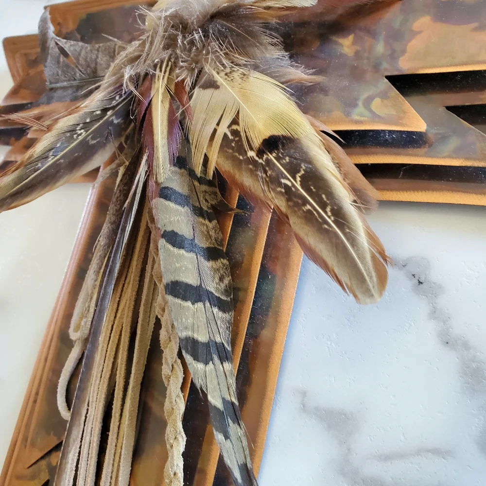Metal Cross with Feathers Wall Hanging